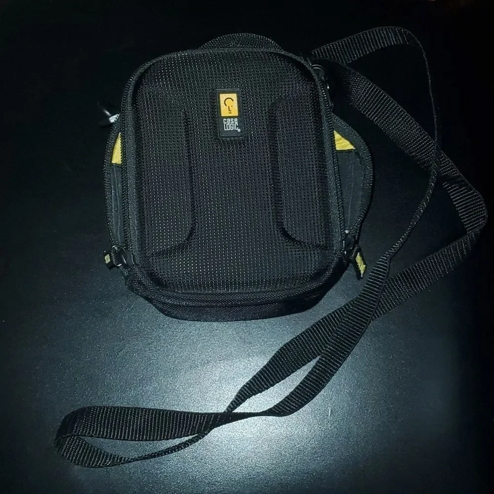 Caselogic case black yellow storage case clean very lightly used preowned vguc